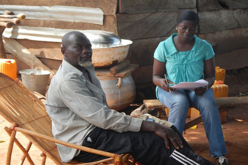 Enumerator and farmer in Ghana.jpg